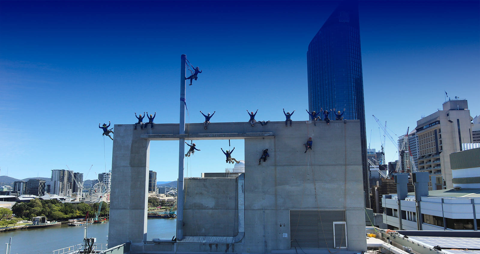 The Gecko Rope Access team climbing high in the city