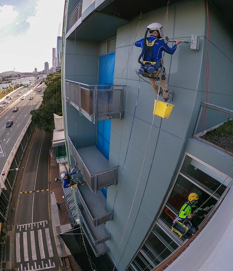 rope-access-professionals-completing-building-maintenance